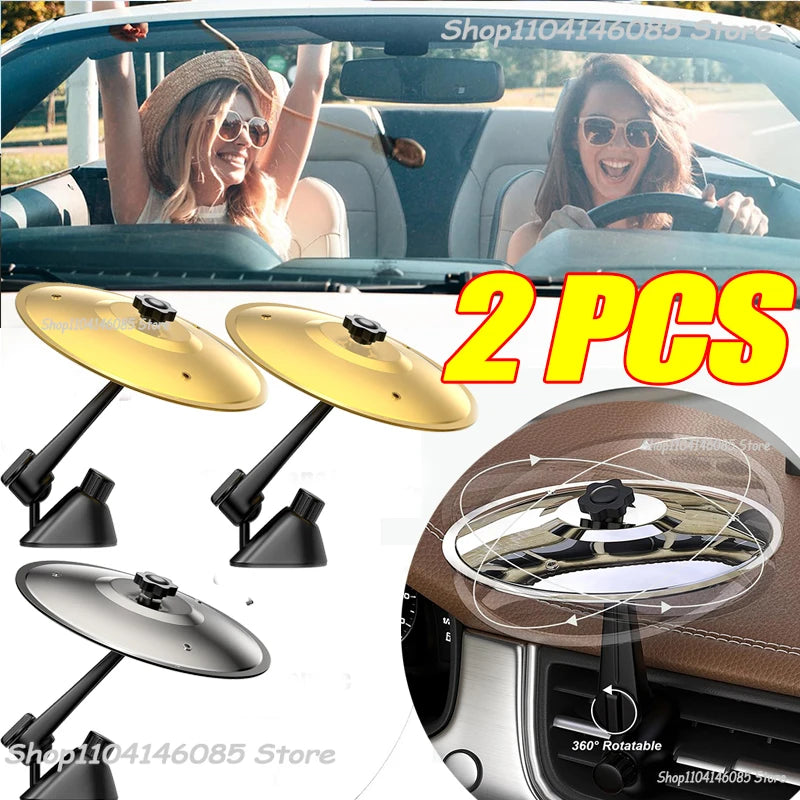 Two gold clip-on car vent cymbals and a brown drum accessory for on-the-go rhythm.