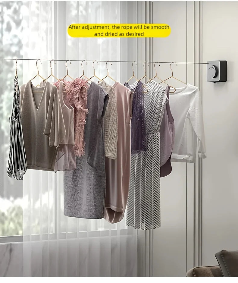 A clothesline displaying various hanging garments, demonstrating a retractable line for drying clothes.
