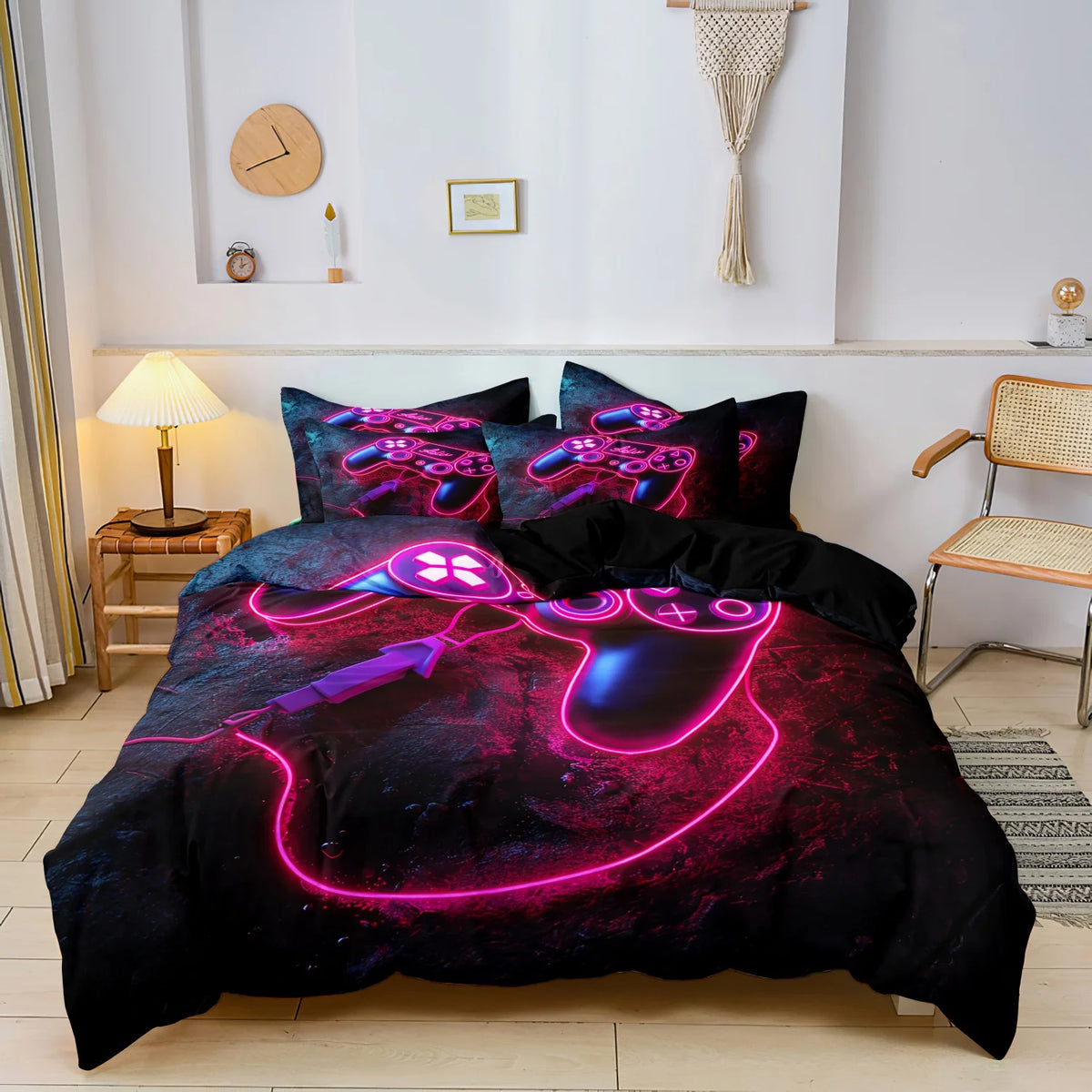 A black duvet cover featuring a neon pink gamer controller and keyboard print on a dark background.