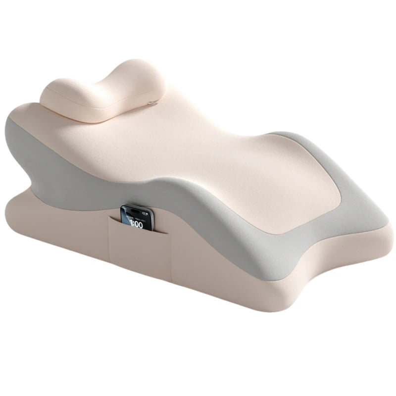 A beige memory foam full-body support pillow with a gray accent, shown from the side.