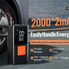 A black portable tire inflator device is shown next to a car wheel, highlighting its features for handling emergencies.