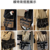 A display showing the features of a chic nylon shoulder bag with chain accents in various colors and styles.