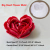 A red heart-shaped silicone mold for making flowers, candles, or soap.