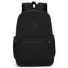 Black urban nylon backpack with a flap closure and a zippered pocket.