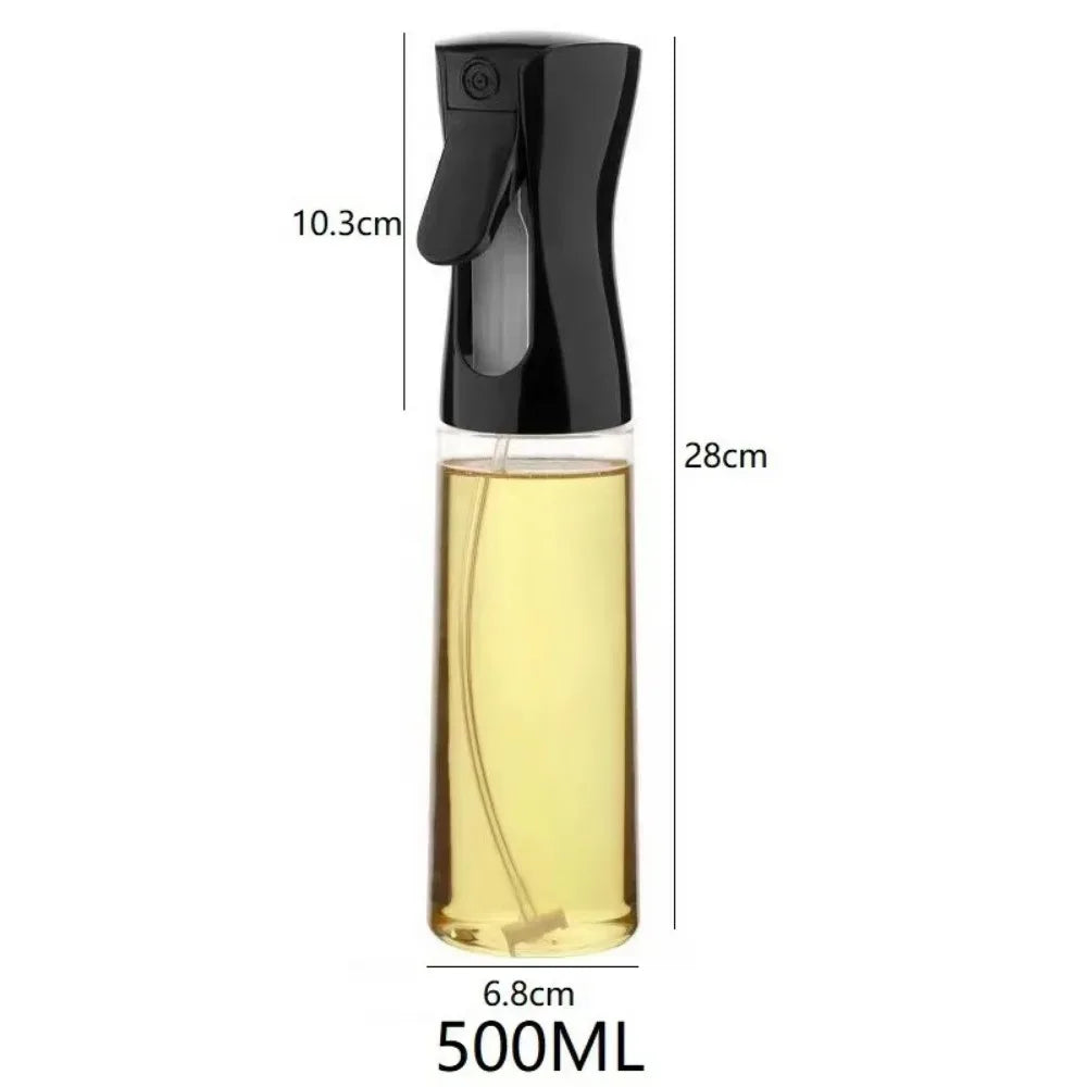 A clear glass oil spray bottle with a black pump dispenser and yellow liquid inside.