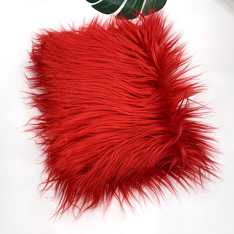 A vibrant red faux fur fabric used for DIY sewing, doll hair, and cosplay.