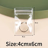 A clear self-sealing jewelry storage bag containing a silver ring, shown against a light background.
