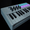Portable 25-Key MIDI Controller with Pads and Wireless Connectivity