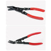A pair of black and red automotive trim removal pliers or clip puller tool.
