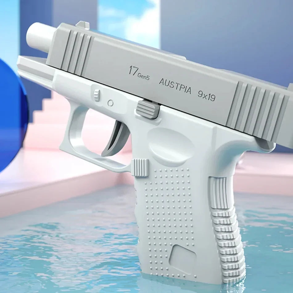 A white high-capacity water blaster pistol is shown resting in water.