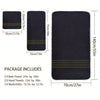 A set of black bath towels, hand towels, and washcloths with gold accents, packaged for sale.