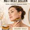 A woman is holding a facial lymphatic drainage brush with natural bristles and a wooden base.