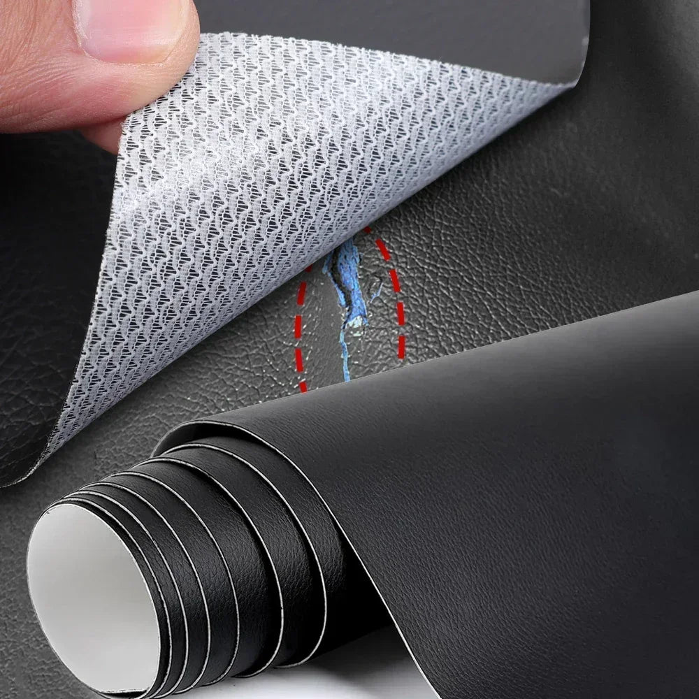 A hand is peeling off a piece of gray self-adhesive leather repair tape, showing a small tear in the material.