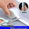 A hand is shown using scissors to cut a flexible white silicone weather stripping seal tape for doors and windows.