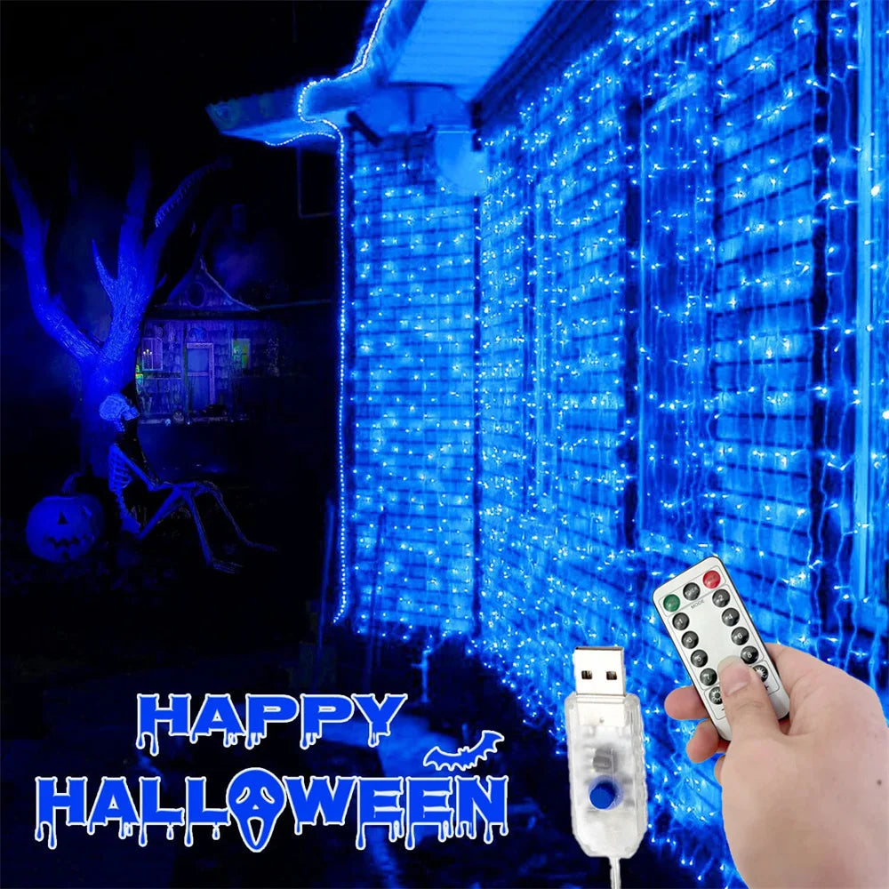 Blue LED curtain lights with remote illuminating a building facade for Halloween decoration