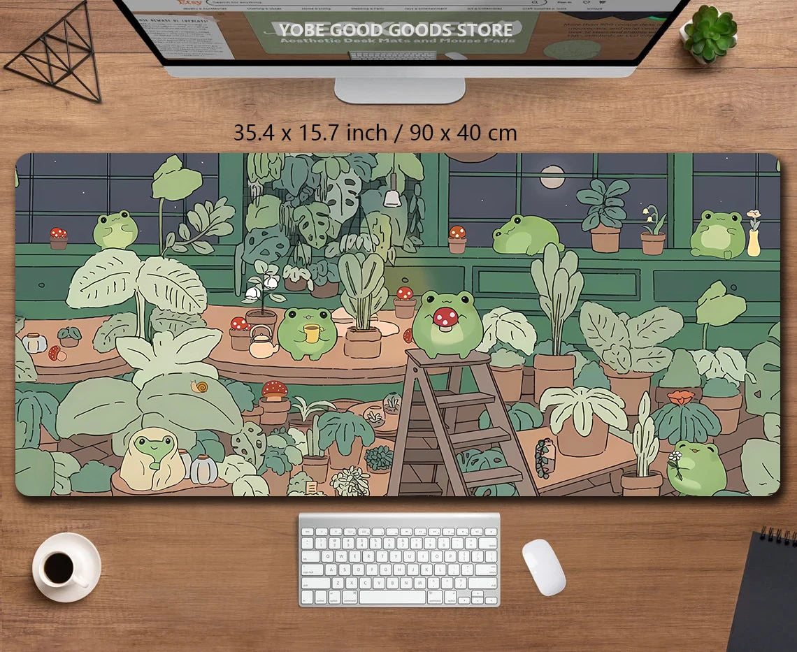 A large desk mat featuring a kawaii nature design of various frogs and plants.