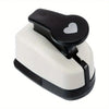 A black and white heart-shaped paper punch set for crafting.