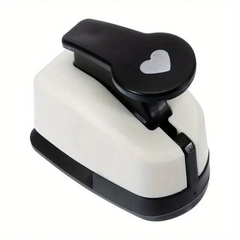 A black and white heart-shaped paper punch set for crafting.