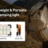 A lightweight and portable camping light is shown being carried in a beige backpack outdoors.