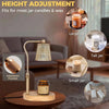 A gold-toned adjustable electric lamp designed for height adjustment, shown next to various sized jars.