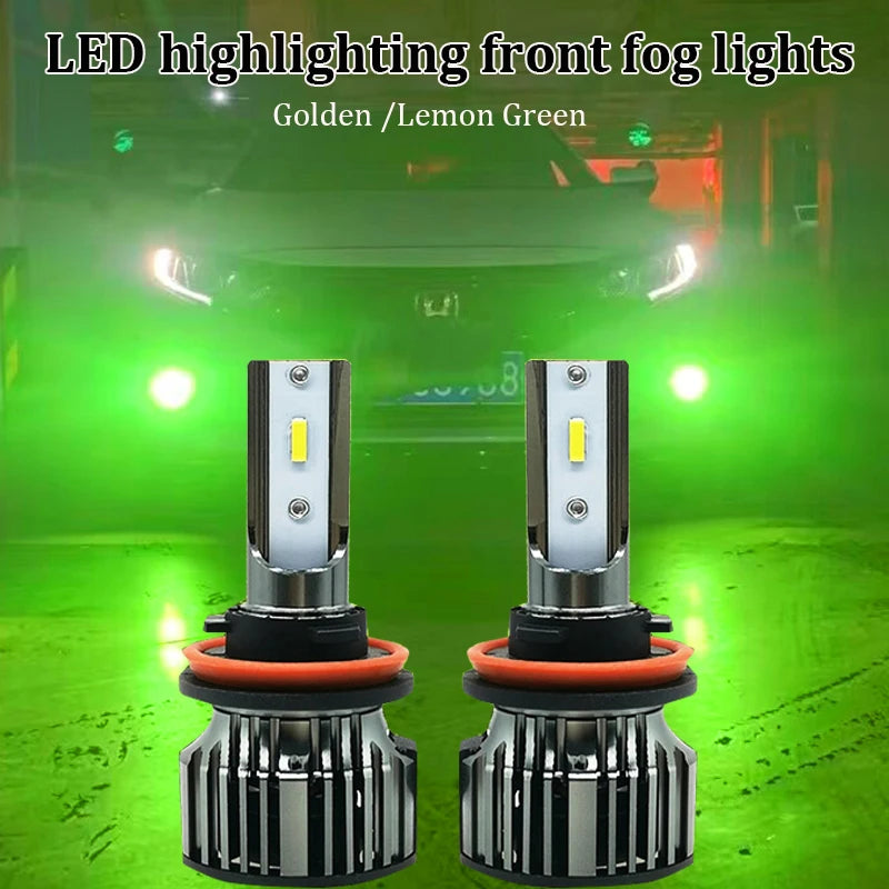Pair of gold or lemon green LED highlighting front fog lights installed in a vehicle.