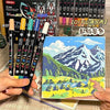 A set of dual-tip acrylic paint markers with 48 vibrant colors displayed next to a blank canvas.