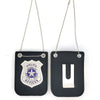 A black police badge role-play accessory with a silver emblem and chain hanging from it.