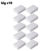Ten white melamine sponge cleaning erasers arranged in a grid formation.