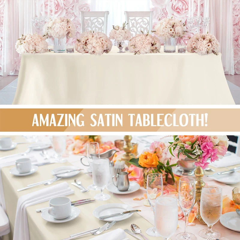 A luxurious satin tablecloth set up for formal dining featuring pink floral arrangements and elegant tableware.