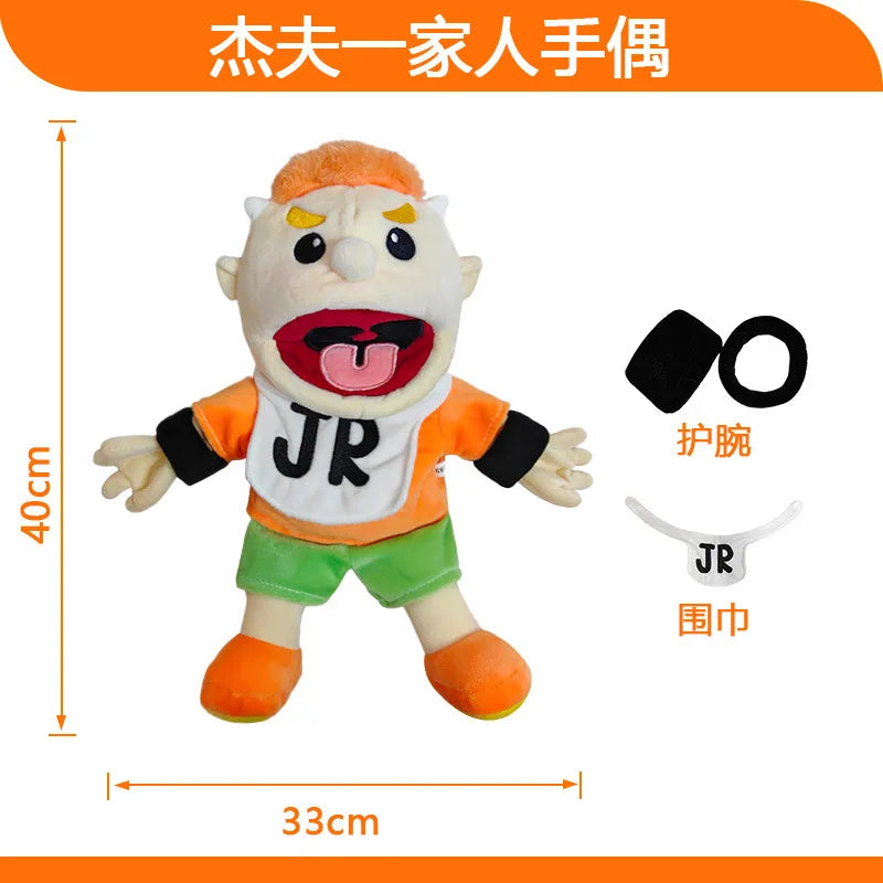 A soft plush hand puppet of a zombie boy with orange skin and white hair, featuring the initials JR.