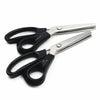 A pair of silver-bladed professional pinking shears with black handles.