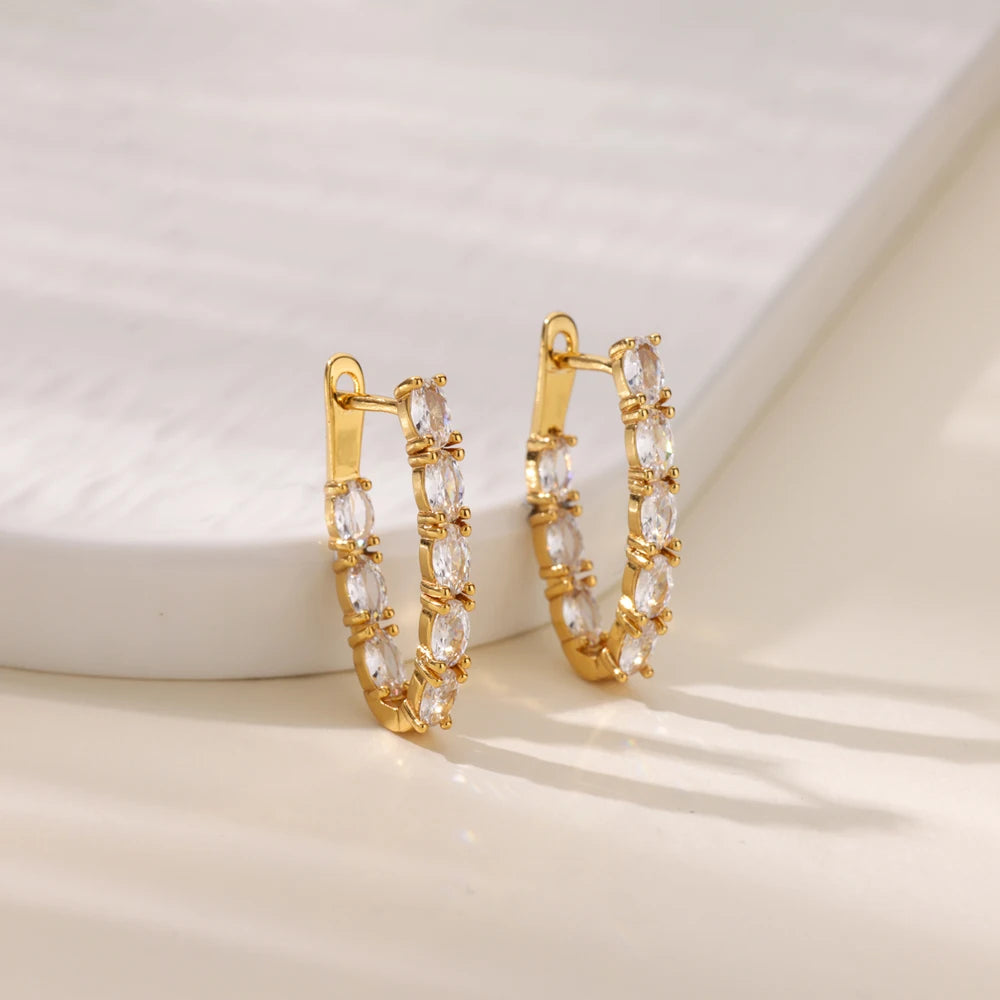 Boucles d'oreilles créoles en zircon cubique ton or