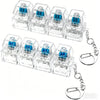 Clear acrylic LED macaron keyboard fidget toys in blue and silver packaged as a keychain set