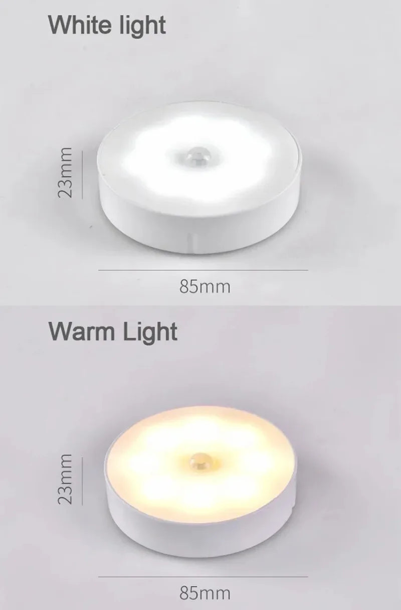 A comparison of a white light and a warm light version of a round LED night light, both measuring 85mm in diameter and 23mm t