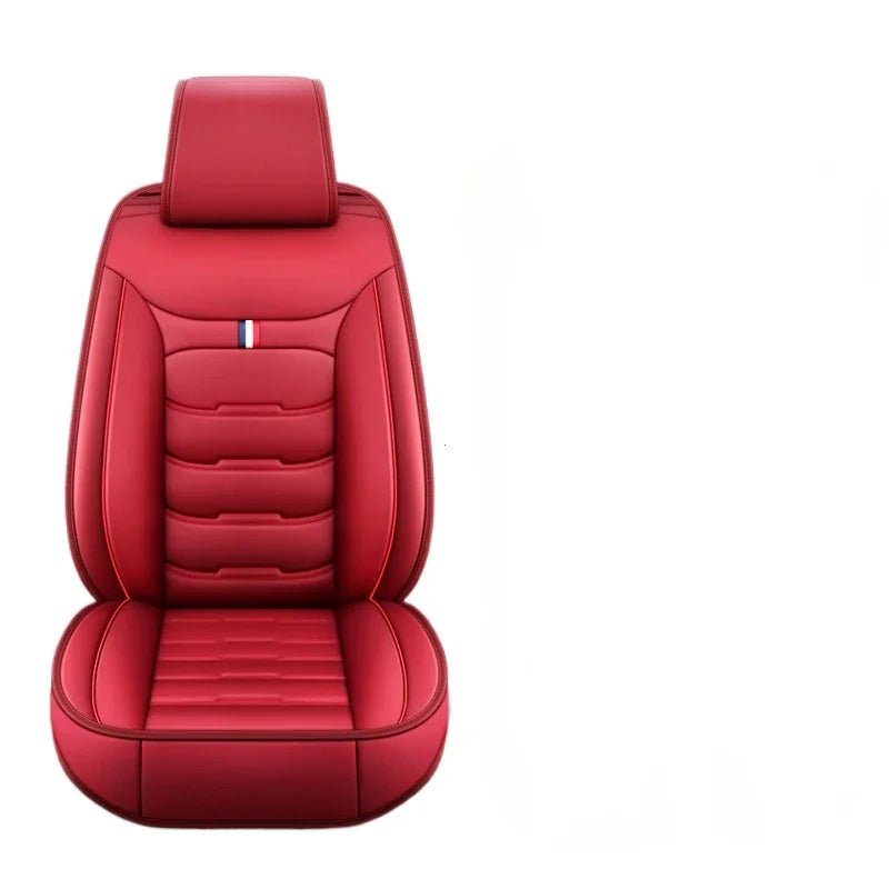 A red PU leather car seat cover for a single front seat, featuring stitching and a small flag emblem.