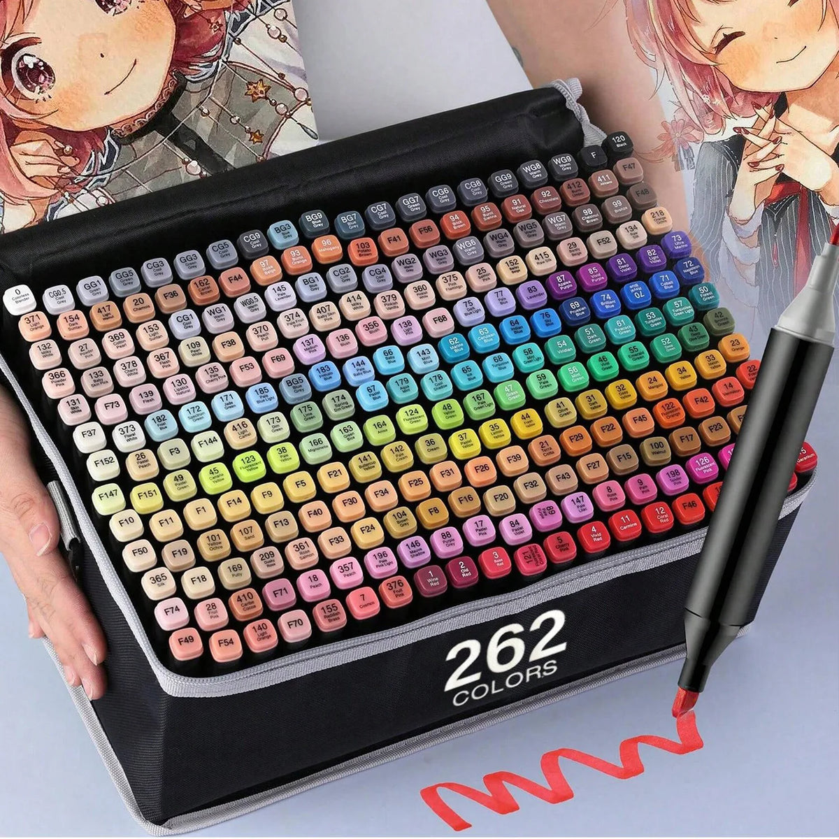 A black case of 262 alcohol markers is shown next to a hand and a drawing.