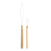 A wooden hair extension installation kit featuring a needle tool and silicone-lined micro rings.