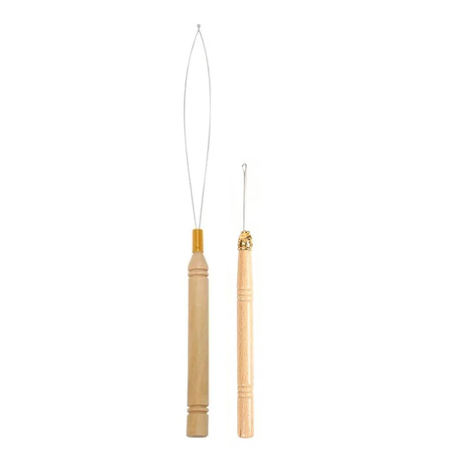 A wooden hair extension installation kit featuring a needle tool and silicone-lined micro rings.