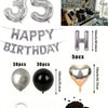 A kit featuring oversized silver foil numbers, balloons, and heart-shaped balloons for birthday decorations.