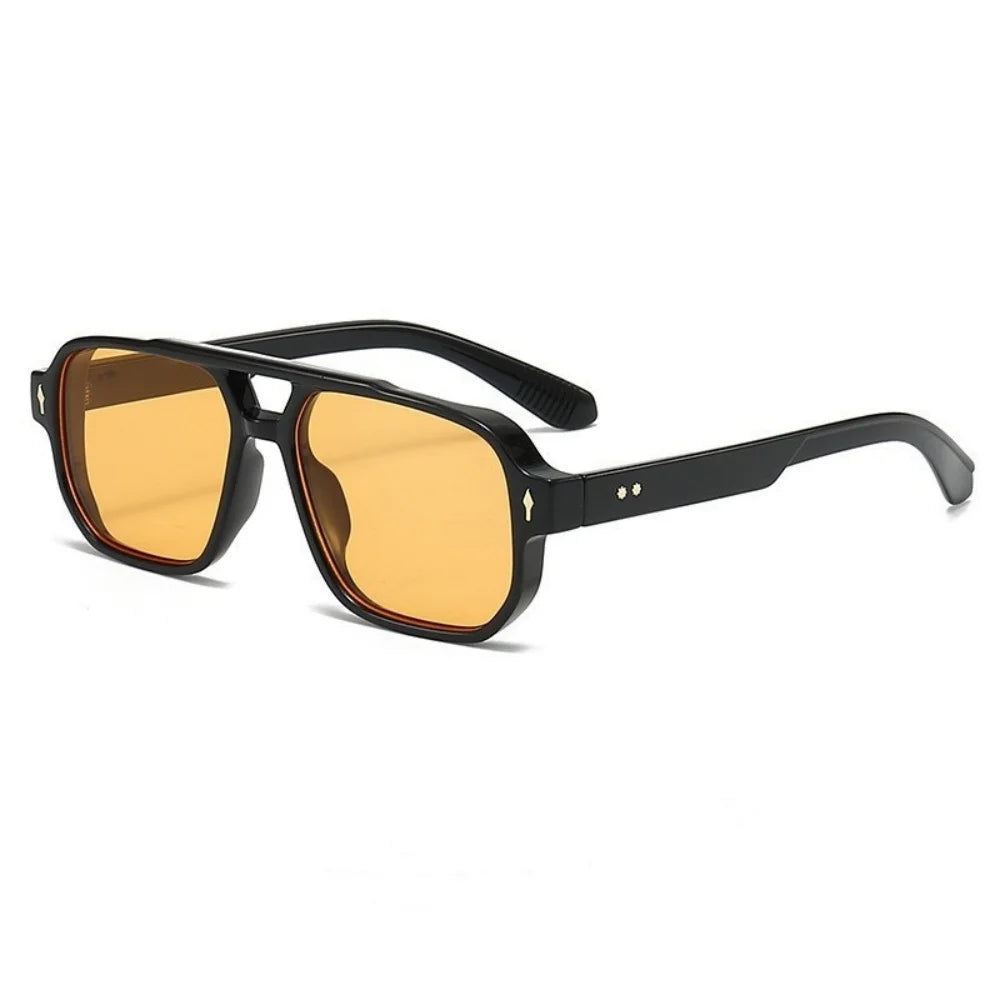 A pair of retro double-bridge square sunglasses with amber lenses and black frames.