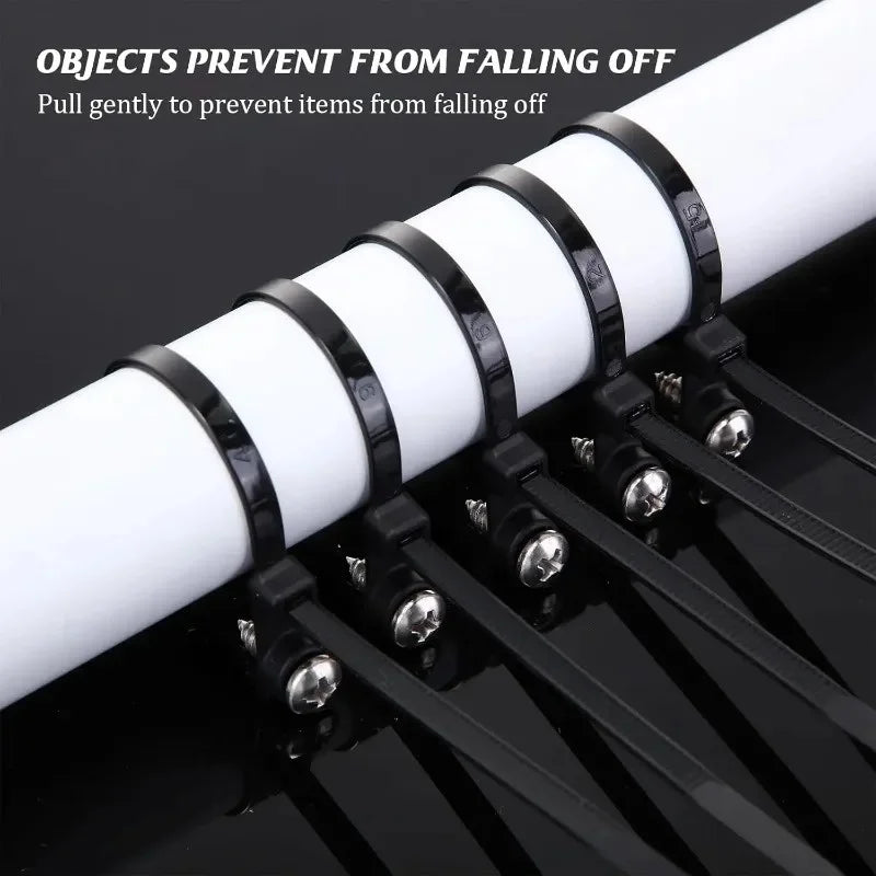Black reusable screw-hole cable ties preventing items from falling off a white pole.