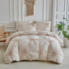 A beige three-dimensional pleated floral duvet cover set displayed on a bed in a bright room.