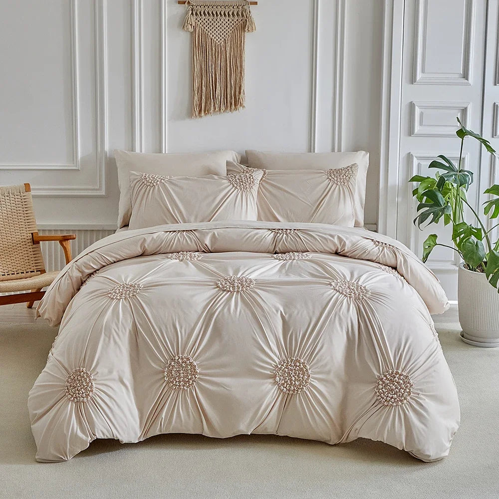 A beige three-dimensional pleated floral duvet cover set displayed on a bed in a bright room.