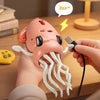 A hand holds a pink octopus toy with white tentacles and a black connector, demonstrating its interactive features.