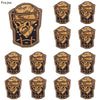 A set of ten embroidered iron-on patches featuring skull and horror designs in gold and black.