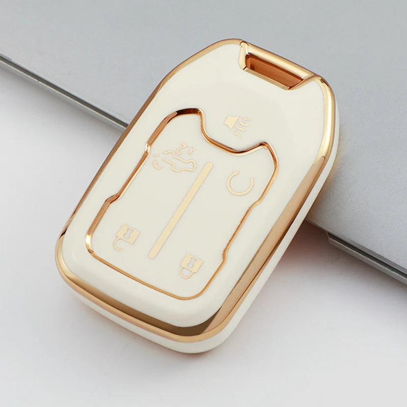 A beige TPU smart key fob cover for GMC and Chevrolet trucks and SUVs, shown in a close-up view.