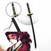 A black metal sword replica with a gold hilt and a chain, shown next to a character illustration.