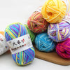 A collection of brightly colored milk cotton blend yarn skeins in various shades including yellow, pink, green, and blue.