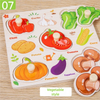 A wooden puzzle set featuring various vegetables like chili, tomato, corn, potato, pumpkin, and eggplant.