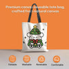 White canvas tote bag featuring a green Christmas tree character design